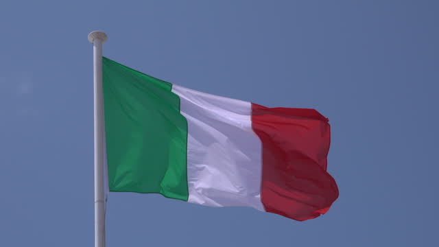 Italian flag waving in the wind on a flagpole