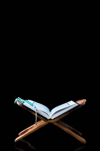 istock The Holy Al Quran with written Arabic calligraphy 1504125369