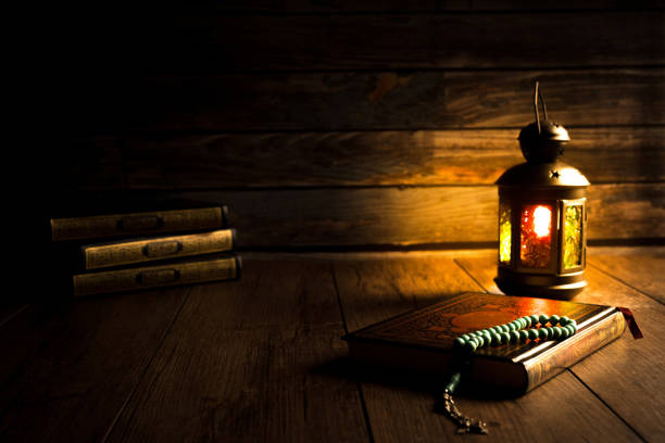 istock The Holy Al Quran with written Arabic calligraphy 1504125381