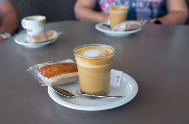 istock Having three coffees in a cafeteria, with 3 muffins. 1504128056