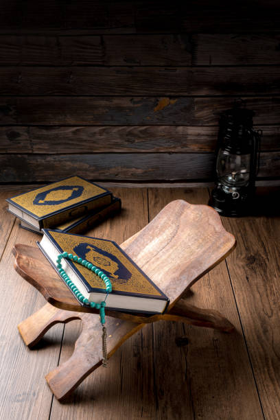 istock The Holy Al Quran with written Arabic calligraphy 1504128065