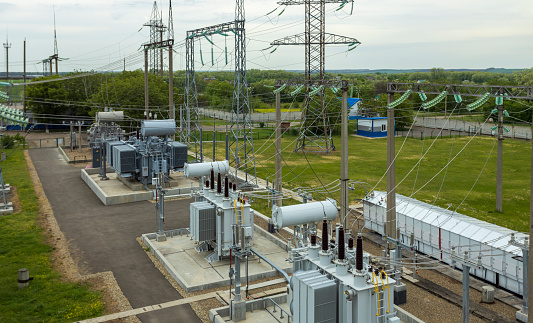 Top view of the electrical substation. Substation with transformers, insulators and switches distributing high voltage.