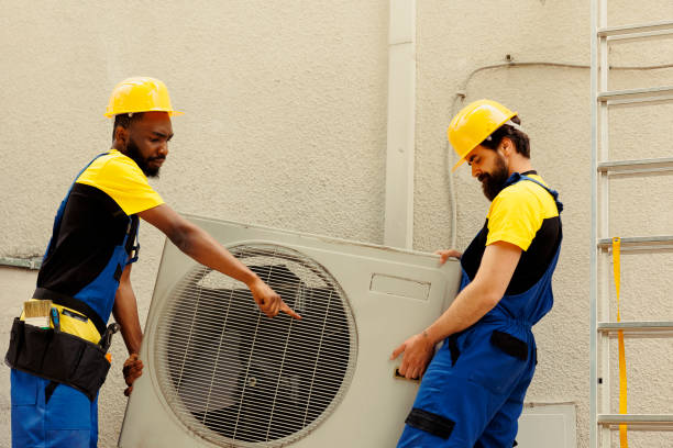 istock Coworkers open malfunctioning condenser 1504146370