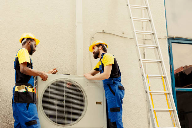 istock Repairmen taking apart hvac system 1504147710