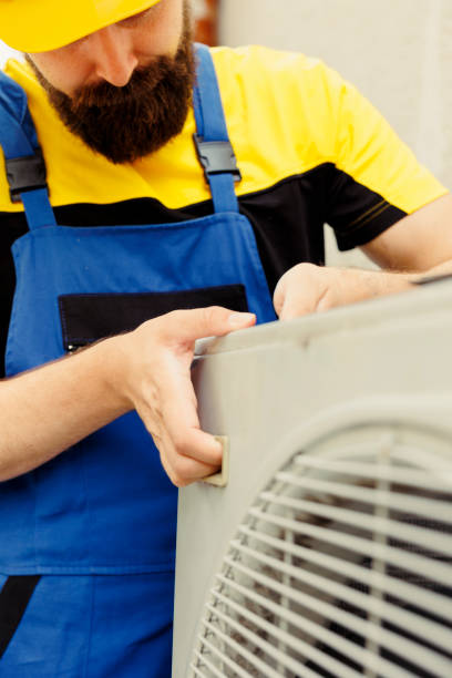 istock Repairman installing condenser, close up 1504156060