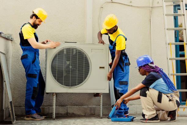 istock Coworkers installing air conditioner 1504159185