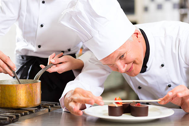 istock Chef as Patissier cooking in Restaurant dessert 150416260