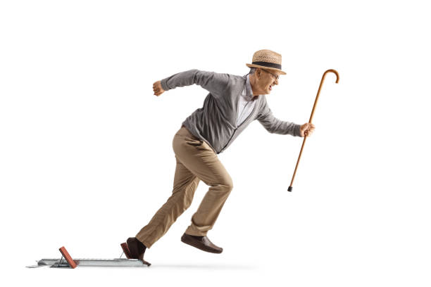 istock Senior man running a race from starting blocks 1504165579