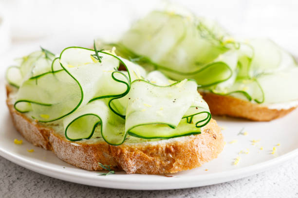 istock Breakfast bread sandwiches with sliced cucumber and cream cheese. 1504167553