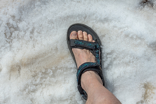 A foot in the snow,Primorska, Julian Alps,Slovenia, Europe