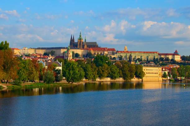 Classic panoramic view of medieval Prague. Scenic landscape of ancient Prague Castle and Saint Vitus Cathedral with Vltava River. UNESCO World Heritage Site. Travel and tourism concept.