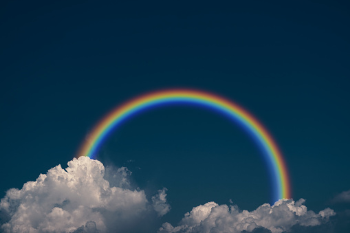 rainbow back dark cloud on the sky, concept problem and Threat ofthen has opportunity, turn crisis into opportunity