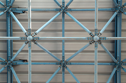 Modern metal warehouse roof inside close up