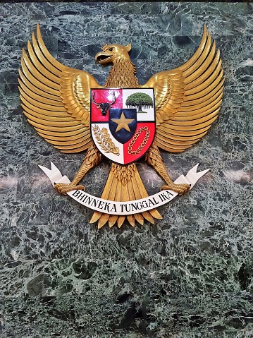 Picture taken in Indonesia National Monument, Jakarta (or known as Monas) about Indonesia national symbol known as Garuda Pancasila with 5 principles and motto of Unity in Diversity