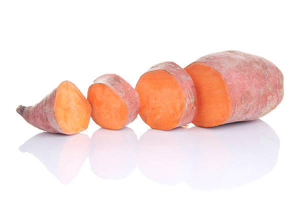 Sweet potato&#1077;s ( lat. Ipomoea batatas ), isolated on white stock photo