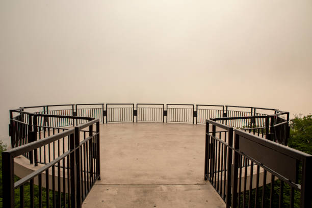 The forest fires in Canada cause smoke and fog to block the view of the city of Pittsburgh from this observation deck in the neighborhood of Mt. Washington.