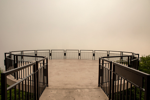 The forest fires in Canada cause smoke and fog to block the view of the city of Pittsburgh from this observation deck in the neighborhood of Mt. Washington.
