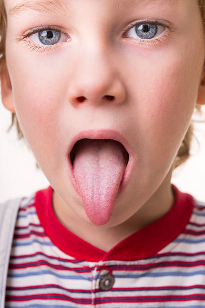 istock toddler shows tongue 150419025