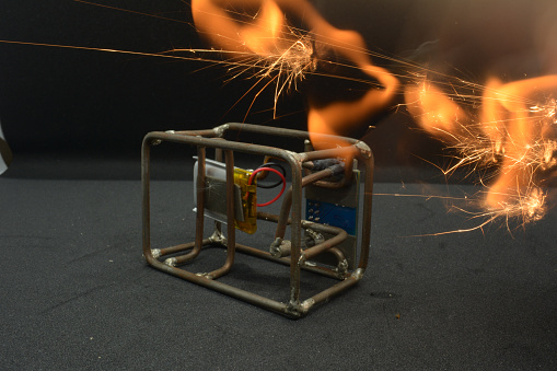 electronic equipment fire on a black background