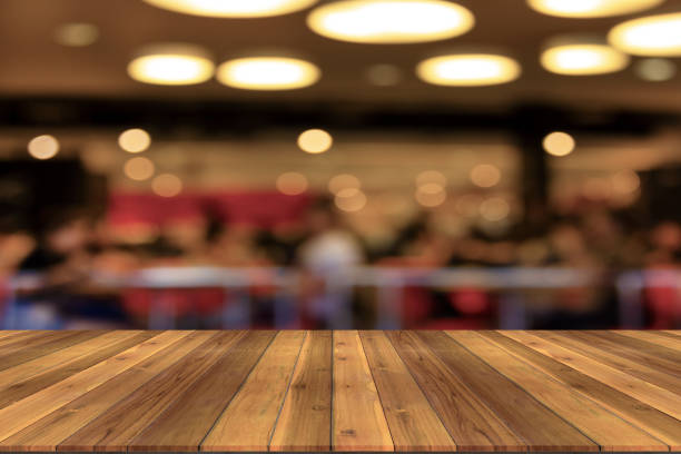 istock Top desk with blur restaurant background,wooden table 1504241904