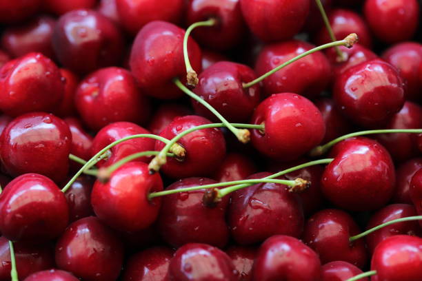 istock red cherries in the market 1504247732