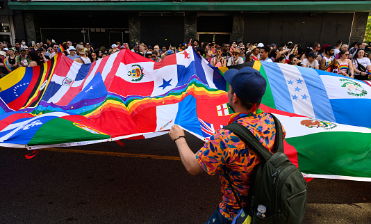 Toronto, Canada - June 25, 2023: The Pride Toronto Parade is organized by Pride Toronto, a non-profit organization. It hosts the annual Pride Month celebrations in Toronto, Canada, which attracts millions of attendees from around the globe.