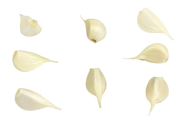 garlic. Garlic cloves isolated from background garlic. Garlic cloves isolated from background acrid taste stock pictures, royalty-free photos & images