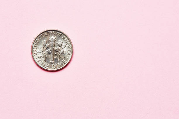 istock US dime coin on a pink background with copy space 1504270788