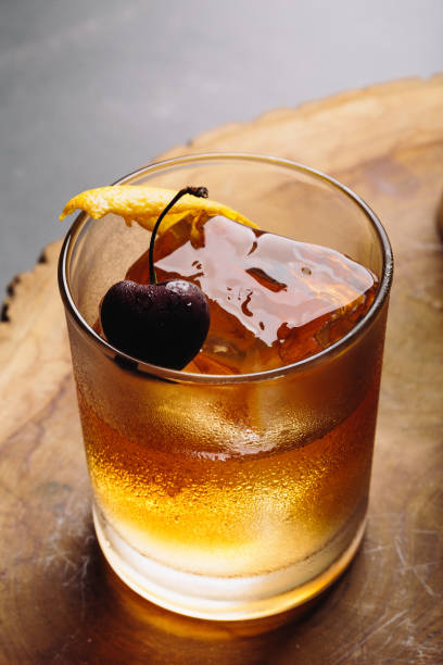 istock Old Fashioned Cocktail booze bourbon whiskey, sugar cube and aromatic bitters 1504270790
