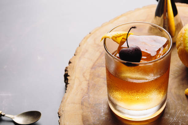 istock Old Fashioned Cocktail booze bourbon whiskey, sugar cube and aromatic bitters 1504270804