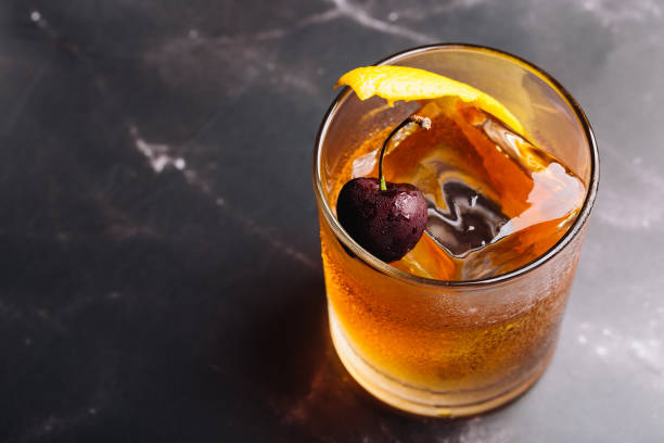 istock Old Fashioned Cocktail booze bourbon whiskey, sugar cube and aromatic bitters 1504272988