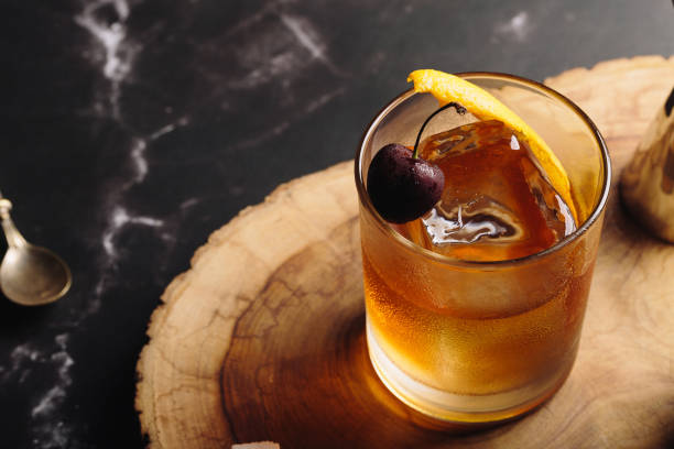 istock Old Fashioned Cocktail booze bourbon whiskey, sugar cube and aromatic bitters 1504273544