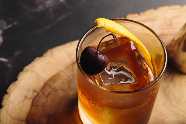 istock Old Fashioned Cocktail booze bourbon whiskey, sugar cube and aromatic bitters 1504273554