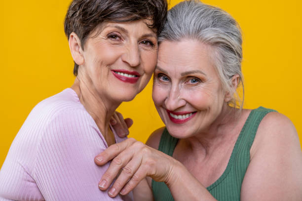 istock Active senior women standing close and smiling happily 1504274675