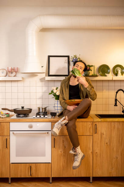 istock Man with a salad at beautiful kitchen 1504281922