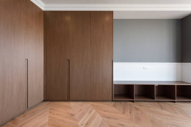 istock empty living room with wood wardrobe in apartment 1504285274