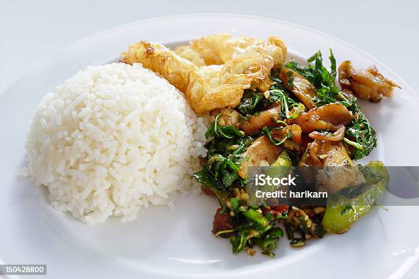 Spicy Stir Fried Chicken On Rice Stock Photo - Download Image Now - Basil, Bell Pepper, Black Peppercorn