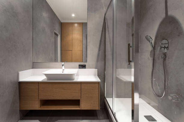 モダンなインテリアのホテルのバスルームの洗面台とシャワー - bathroom cabinet door drawer ストックフォトと画像