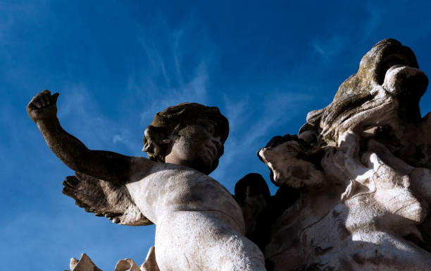 istock little angel playing with the big lion 1504297015