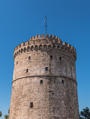 A close-up of the White Tower of Thessaloniki, a historical monument located in Thessaloniki, Greece