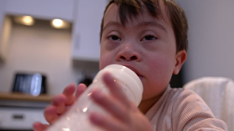 Feeding from Milk Bottle