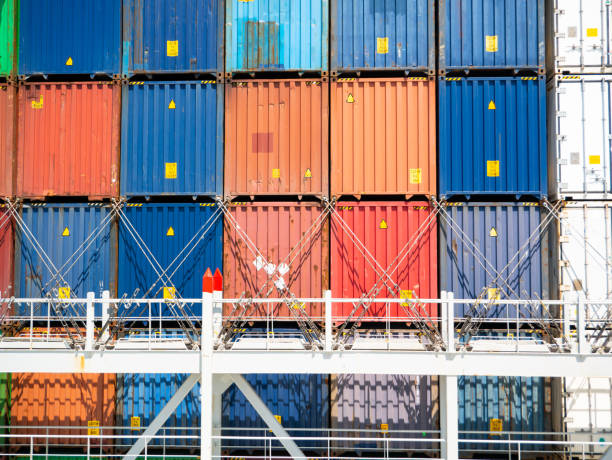 istock Different color containers loaded on ultra large container vessel 1504332477