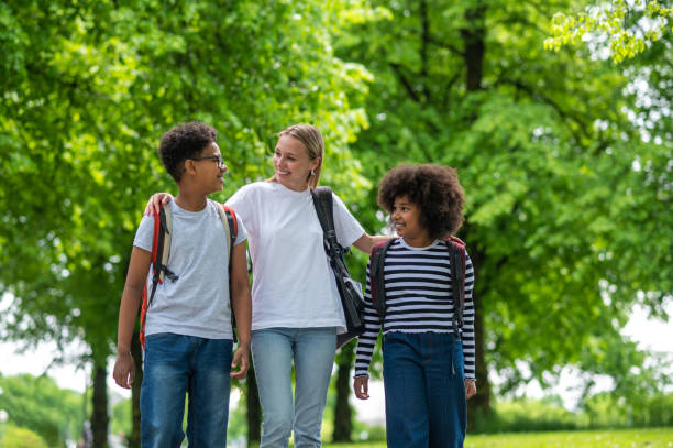 istock Friends walking in the park and feeling contented 1504355815