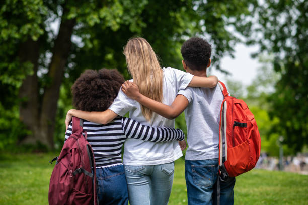 istock Volunteer spending time with kids and all looking happy 1504355830