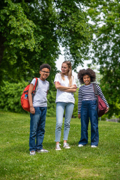 istock Volunteer spending time with kids and all looking happy 1504355838