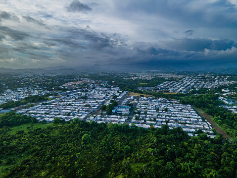 Aerial view of community in Toa Alta, Puerto Rico on a cloudy day.