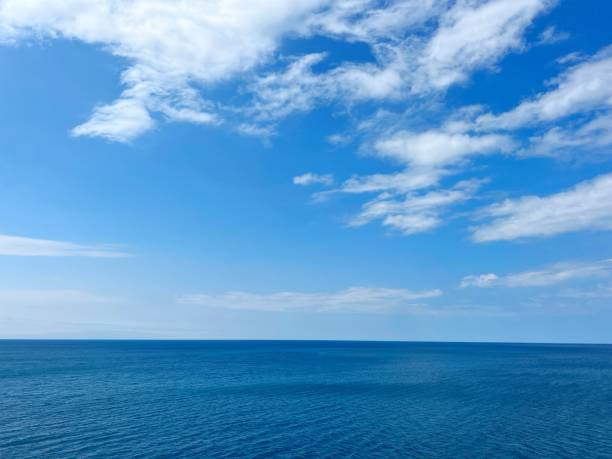 istock Blue sea blue sky white clouds horizon. 1504385058