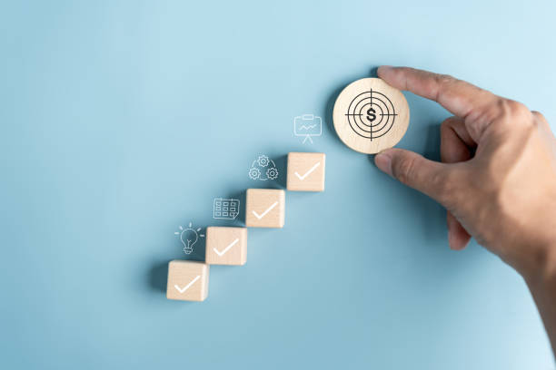 istock Business growth success achievement concept, hand arranging wooden block stacking as step stair or ladder for planning development leadership and customer target group concept. 1504389700