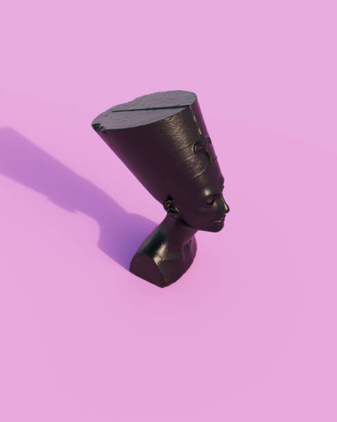 istock Black Nefertiti Egyptian African Queen Bust Crown Sunlight Pink Background 1504403149