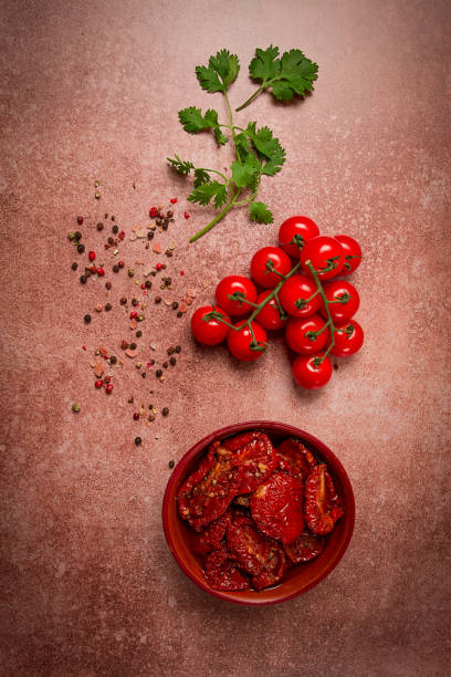 istock dried tomatoes, in a bowl, top view, on a brown background, 1504441950